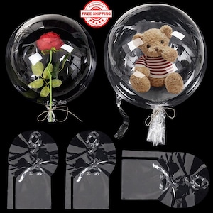 May include: Two clear plastic balloons with a red rose and a teddy bear inside. The balloons are tied with string and come with clear plastic sleeves for holding the items.
