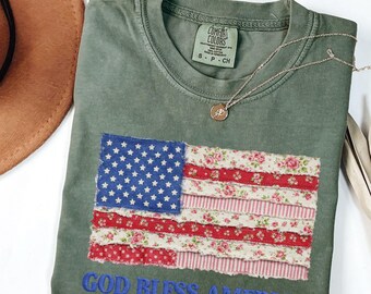 Camiseta "Dios bendiga a América" de Comfort Colors, camiseta con la bandera estadounidense y estampado floral, camiseta patriótica, camiseta del 4 de julio, camiseta vintage de EE. UU., camiseta con temática religiosa.