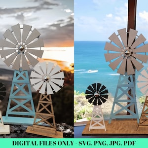 Może przedstawiać: Trzy miniaturowe drewniane wiatraki, jeden niebieski, jeden brązowy i jeden biały, z łopatkami wiatraka w kolorze szarym, białym i czarnym na każdym. Wiatraki stoją na drewnianej podstawie.  TYLKO PLIKI CYFROWE - SVG, PNG, JPG, PDF