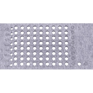 May include: A rectangular, gray felt WaveTable with numerous evenly spaced circular holes. The felt has several rows of holes of varying sizes. A small potted cactus is in the upper left corner. The copyright notice "WaveTable 2025" is in the lower right corner.