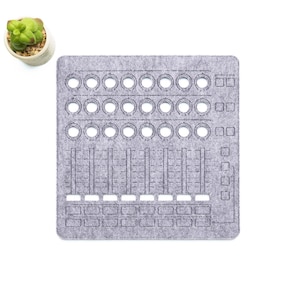 May include: A gray felt sound mixer with multiple knobs and sliders, resembling a mixing console. A small potted succulent is in the upper left corner. The design is on a white background.