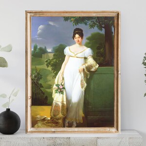 May include: A painting of a woman in a white dress with a floral shawl. She is standing in a garden setting with a green wall behind her.