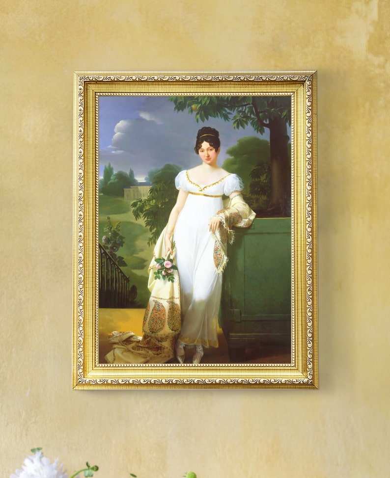 May include: A framed oil painting of a woman in a white dress standing in a garden setting. She is holding a bouquet of flowers and wearing a shawl. The painting is set against a backdrop of lush greenery and a cloudy sky.