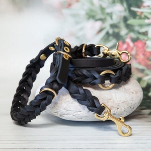 Conjunto elegante de trela e coleira para cães em preto. Conjunto exclusivo de couro para cães. Trela elegante e coleira de couro. Acessórios de couro elegantes.