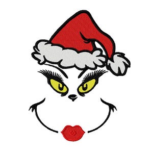 May include: Embroidered design of a green face with yellow eyes, long black eyelashes, and a red Santa hat with white trim. The mouth is a red, smiling shape. The design is on a white background.