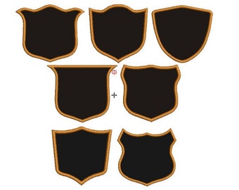 Peut inclure: Ensemble de sept formes de boucliers noirs et dorés. Les boucliers sont de tailles et de formes différentes, mais ils ont tous un fond noir et un contour doré.