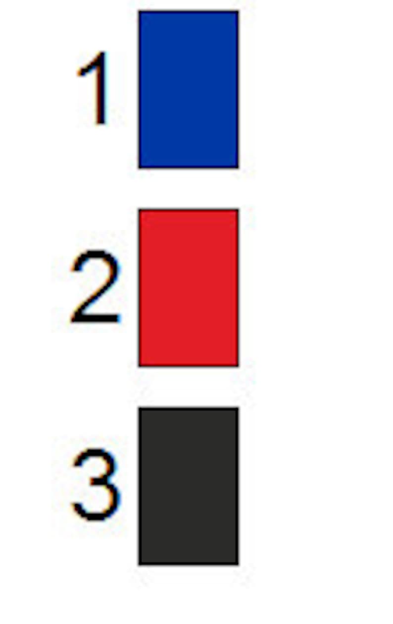 May include: Three paint swatches, one blue, one red, and one black.