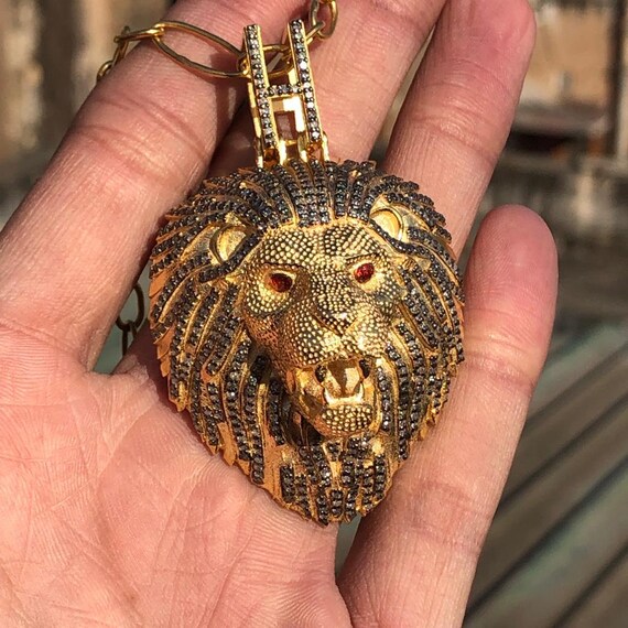Gold diamond sales lion pendant