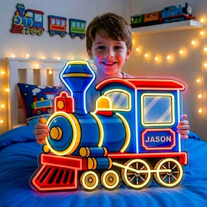 May include: A custom neon sign shaped like a steam locomotive train, featuring vibrant blue, red, and yellow light tubes. The side of the train engine displays the name JASON in bold white letters. The design includes a smokestack and wheels.