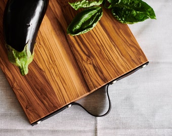 Olive wood cutting board with leather strap