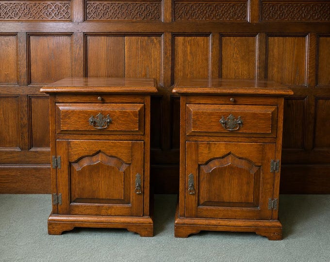 A pair of bedside cabinets manufactured by The Royal Oak Furniture Company