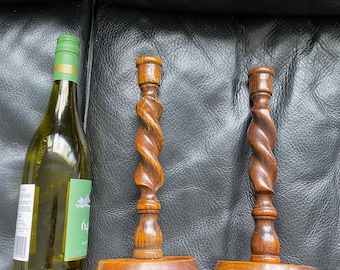 A pair of antique candle sticks