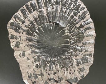 A designer mid-century glass ashtray in excellent condition