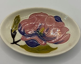 Small Moorcroft magnolia pin dish. on cream ground, no cracks or chips.