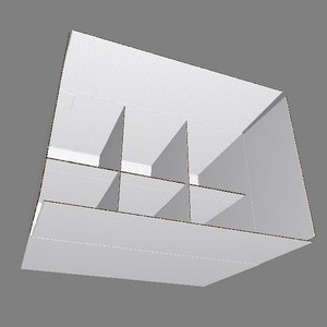 Puede incluir: Una caja de cartón blanca con divisores, creando varios compartimentos. La caja está abierta e inclinada, revelando el interior.