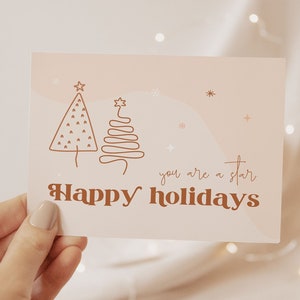 Retro Business thank you card for christmas with a boho vibe. Tw lineart christmas trees and a "Thanks you for you support" text. Editable in Canva.