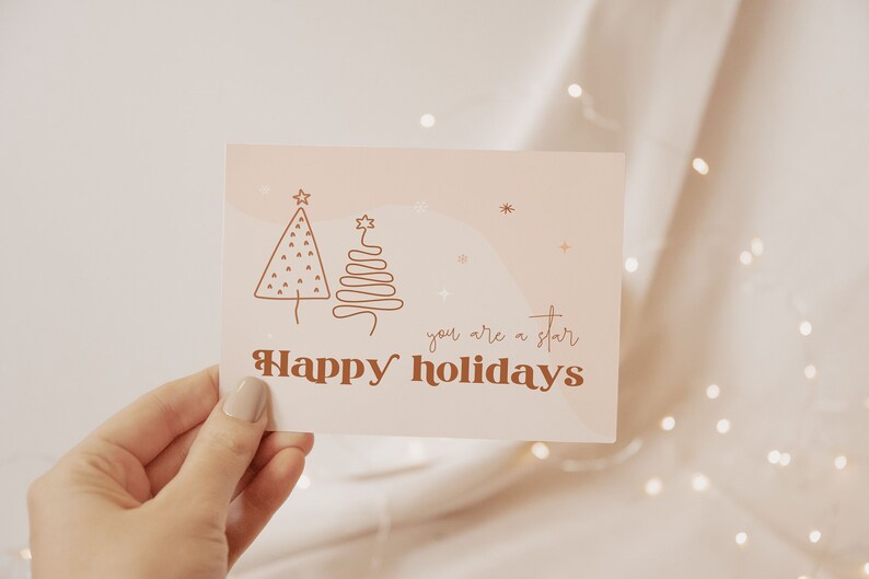 Retro Business thank you card for christmas with a boho vibe. Tw lineart christmas trees and a "Thanks you for you support" text. Editable in Canva.