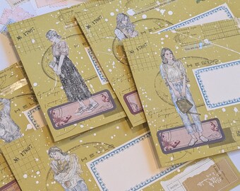 May include: A collection of vintage-style envelopes with illustrations of women in various outfits. The envelopes are a muted yellow-green with white splatter details and decorative borders. Each envelope has a blank space for writing and the text "№ 17807".