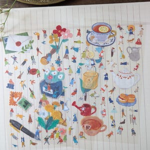 May include: A decorative sheet with various illustrations, including a teacup with a lemon slice, a teapot, flowers, and tiny figures. The sheet also features a pen, a stamp, and an envelope. The overall theme is a whimsical tea party.