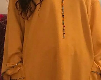 djellaba de joie pour femme. travaillé à la main façon traditionnelle Marocaine