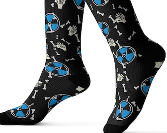 May include: Black knee-high socks with a repeating pattern of blue and white medical symbols, bones, and hands. The socks have a black toe and heel.