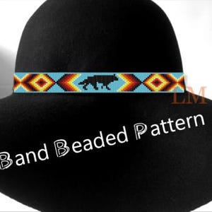May include: A black hat with a beaded band featuring a wolf silhouette and geometric patterns in turquoise, yellow, orange, and red. The text "Band Beaded Pattern" is displayed in white.