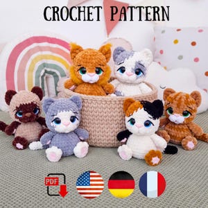May include: A collection of six plush crochet cat toys with large blue or green eyes, arranged in and around a beige woven basket. The text CROCHET PATTERN is displayed at the top, with a PDF icon and three national flags at the bottom.