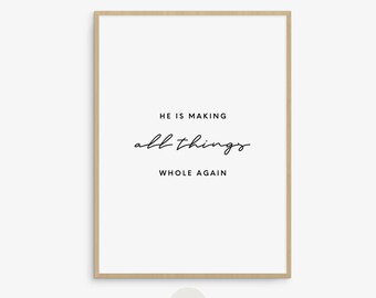 May include: A minimalist printable wall art design with a white background and black text that reads "He is making all things whole again."