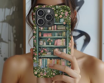 May include: A smartphone case featuring a printed illustration of a teal bookshelf filled with various books, small jars, and vases of flowers. The design is framed by climbing vines with pink and blue blossoms that extend across the entire surface.