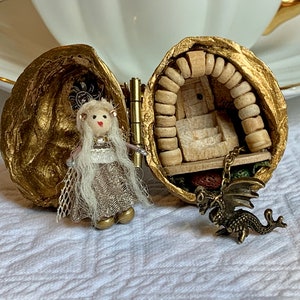 Mother of Dragons miniature scene in a walnut shell.