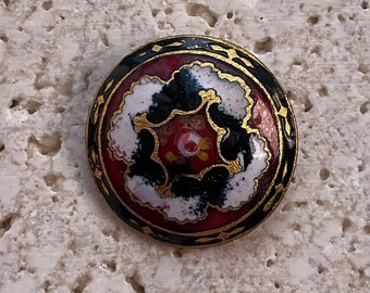 Enamel button in Imari colours.