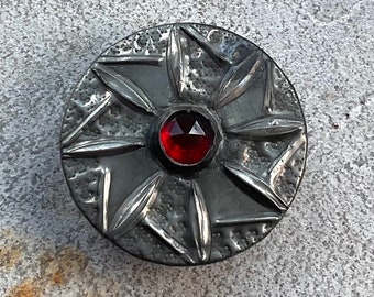 Arts and crafts style  Pewter button.