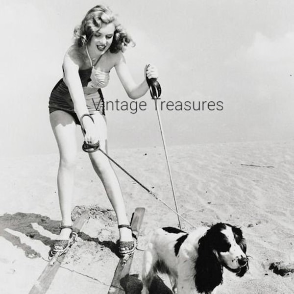 Marilyn Monroe Skiing with her Dog