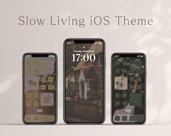 May include: Three iPhone mockups displaying a custom iOS theme with a slow living aesthetic. The theme features a light brown background with yellow and brown icons. The middle phone shows a photo of a house with a green lawn and a wooden fence. The time is displayed as 17:00.