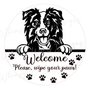 Könnte beinhalten: Schwarz-weiße Silhouette eines Border Collies, der über einem Schild mit der Aufschrift "Willkommen, bitte wische deine Pfoten ab!" schaut. Auf dem Schild befinden sich links und rechts sowie darunter Pfotenabdrücke.