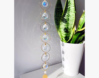 Acchiappasole di cristallo della prosperità: citrino, prismi del fiore della vita che creano arcobaleni