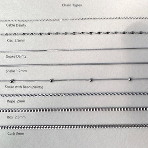 May include: A close-up of eight different types of silver chains, labeled with their names and sizes. The chains are arranged in rows from top to bottom, with the names and sizes of each chain listed below them. The chains include: Cable Dainty, Kiss 2.5mm, Snake Dainty, Snake 1.2mm, Snake with Bead (dainty), Rope 2mm, Box 2.5mm, and Curb 3mm.