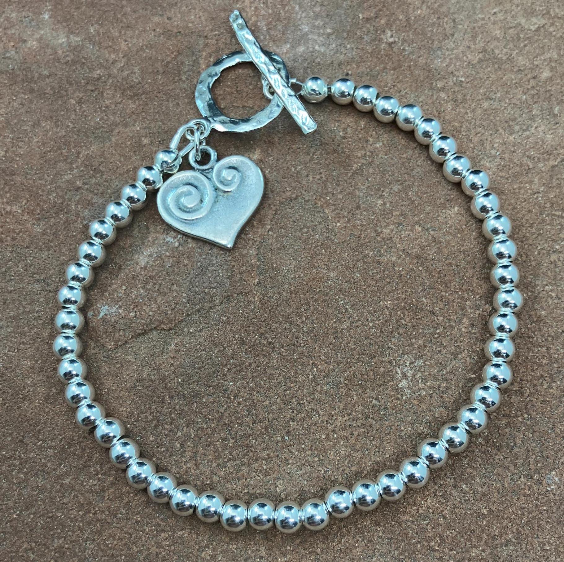 sterling silver beaded bracelet with heart charm and toggle clasp, 7 1/2 inches