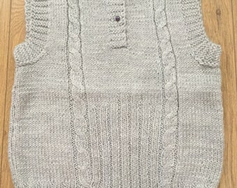 hand knitted baby vests