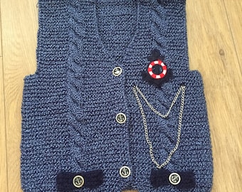 hand knitted baby vests