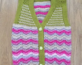 hand knitted baby vests