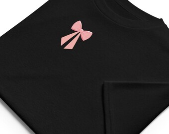 ピンクのコルケットリボンTシャツ | キュートで美しいリボンTシャツ | ガーリーなパステルカラーのレディースグラフィックシャツ | ピンクのリボンTシャツ – キュートでスタイリッシュなファッション