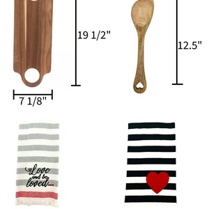 May include: A kitchen gift set with a wooden cutting board, a wooden spoon, and two striped kitchen towels. The cutting board is 19 1/2 inches tall and 7 1/8 inches wide. The spoon is 12.5 inches long. One towel is gray and white with the text "Love and be loved" in red. The other towel is black and white with a red heart.