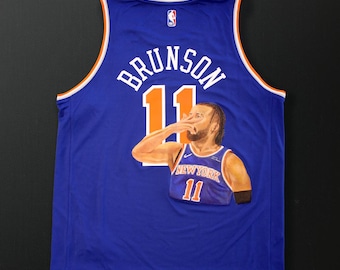 Custom hand painted Jalen Brunson portrait on blue Knicks Jersey.