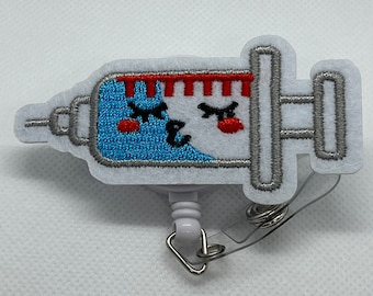 Syringe Needle badge reel, Syringe Needle badge reel.