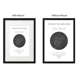 May include: Two black framed prints with white mats showing a star map with the text "The night you were born" and a name. The top print shows the text "With Mount" and the bottom print shows the text "Without Mount".