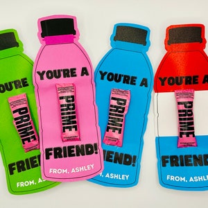 May include: Four colorful cards with the text "You're a Prime Friend!" and a pink Prime Hydration stick on each card. The cards are decorated to look like a bottle of Prime Hydration.