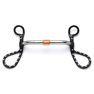 May include: A horse bit in black and silver, featuring a copper-coloured central section. The bit has a curved design with a loop at each end and is branded "CAVALON". Designed for use with a horse's bridle, it is a key piece of equestrian equipment.