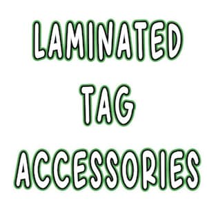 May include: LAMINATED TAG ACCESSORIES text in white with a black outline and a green outline. The text is in a bold, cartoon-like font.
