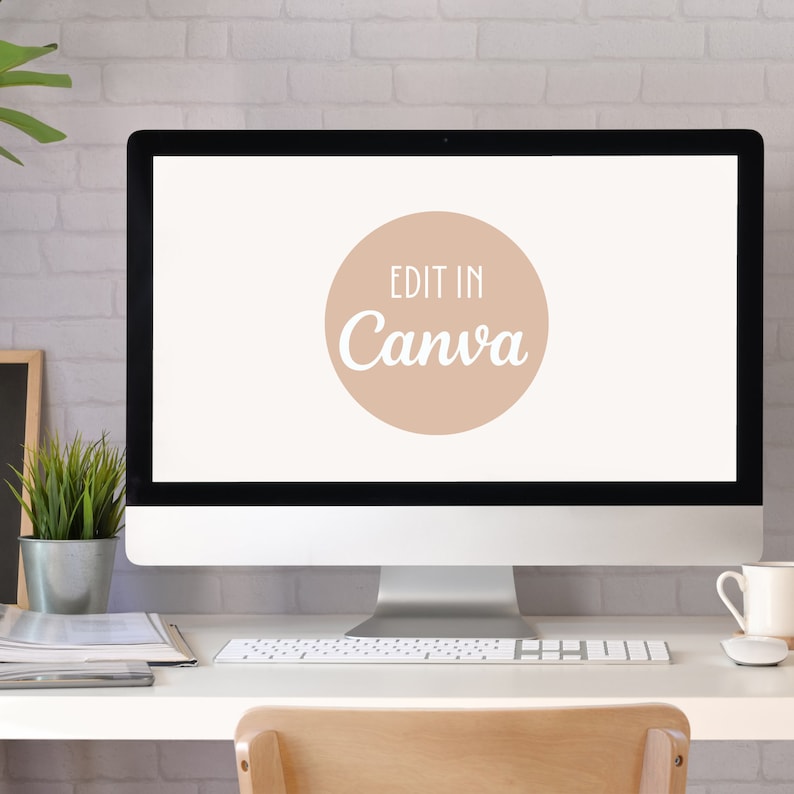 May include: A white desktop computer with a light brown circle on the screen that says "Edit in Canva" in white text. The computer is on a white desk with a white keyboard and a white mug.